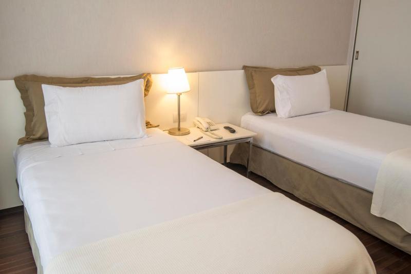 Quarto Família (2 Adultos + 2 Crianças)